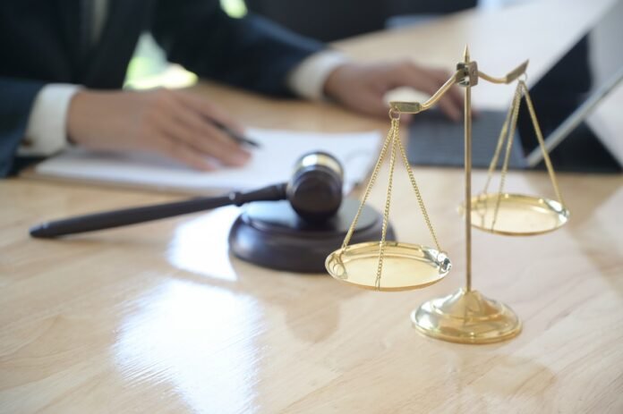 concept of justice lawyer holding a hammer pretend 4RKWXE9